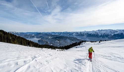 Ski tourers climbing Simetsberg, view of Walchensee, Estergebirge, Bavarian Prealps, Bavaria