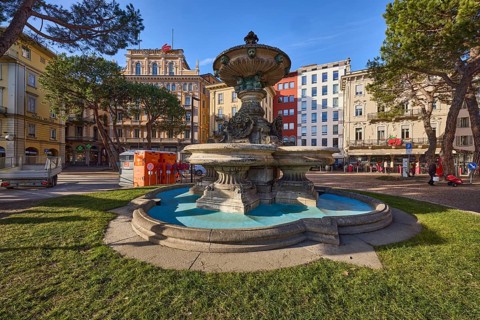 Fountain, Fontana Antonio Bossi, lawn, general architecture, trees, blue sky, street Riva Vincenzo
