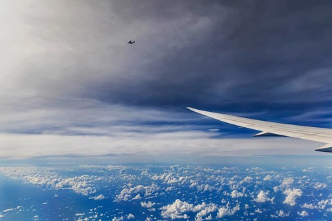 Above the clouds over the Indian Ocean, Bay of Bengal. View from the aircraft window during a