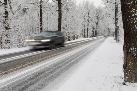 Winter road conditions with snow and icy conditions, here in Spitzgrund near Coswig, where there