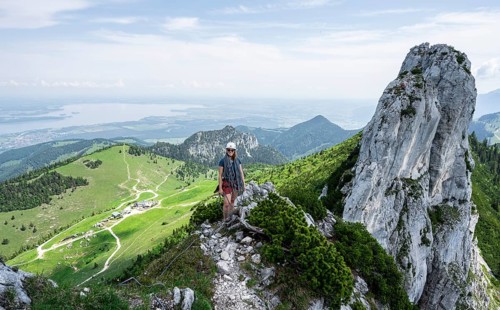 Climber with climbing rope on a climbing tour, climber on a mountain ridge, alpine climbing,