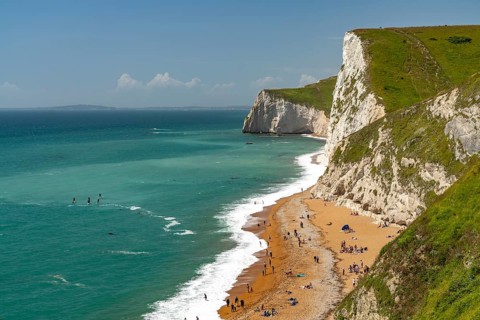 White cliffs and beach of the UNESCO World Heritage Site Jurassic Coast, England, Great Britain