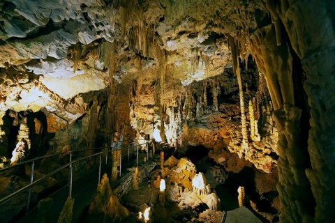 Cave with illuminated stalactites and stalagmites, stalactite cave, Diros Cave, Glyfada Cave,