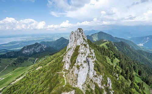 Narrow mountain ridge, summit of the Kampenwand with summit cross at the back, alpine climbing,
