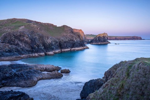 Coastal landscape in Kynance Cove. In the evening at sunset. Long exposure. Kynance Cove, Lizard