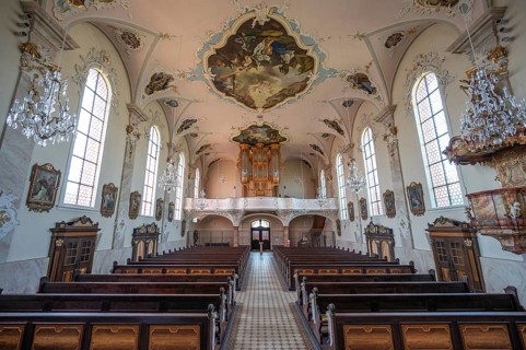 Interior with organ loft of the baroque St Martin's Church, organ from 1768, Riegel am Kaiserstuhl,