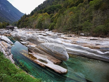 Clear water and rock formations in the Verzasca River, near Lavertezzo, Verzasca Valley, Valle