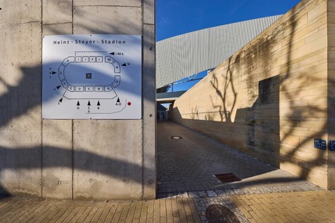 Heinz-Steyer-Stadion, stadium, side entrance, location board, concrete building, deep blue