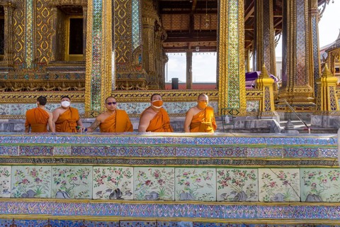 Wat Phra Kaeo temple, royal palace. Royal chapel with Buddhist monks and novices. Bangkok,