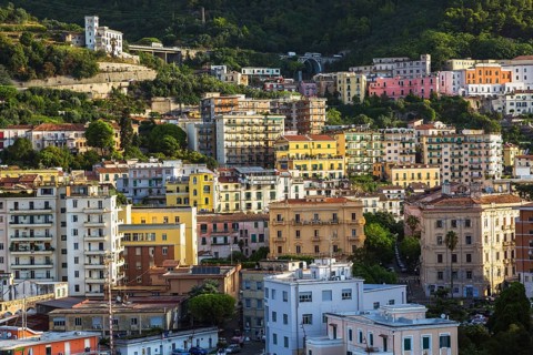High angle view of apartment and condominium buidings plus mountainside, Salerno, Campania region,