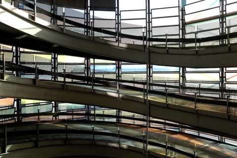Spiral-shaped entrance and exit ramps for cars in a multi-storey car park, Berlin, 22.01.2025,