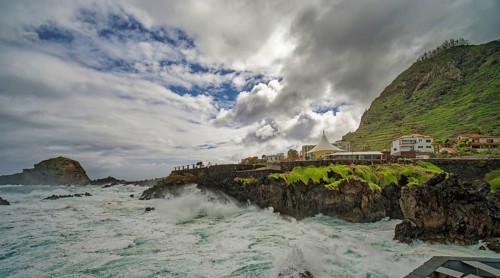 High waves on the rocks of Porto Moniz, surf on the Atlantic Ocean, storm, clouds, Porto Moniz,