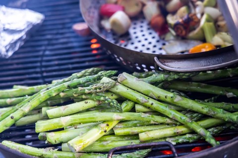 Barbecue, kettle grill with vegetarian and vegan barbecue grills such as grill pan and green