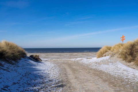 The East Frisian North Sea island of Juist in winter, dune crossing to the beach, snow, Lower