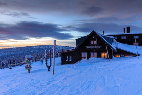 Wossecker Baude at dusk on a winter's day, Harrachsdorf in the Giant Mountains, Czech Republic,