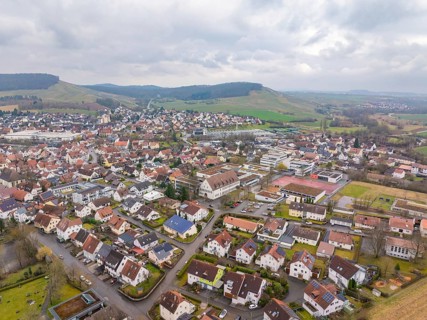 Aerial view of a town surrounded by hills and open spaces, Großbottwar, Ludwigsburg district,