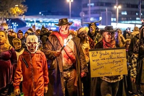 The Zombiewalk in Essen, on Halloween several hundred people, some dressed as scary zombies,