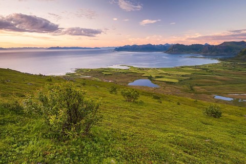 View of the coast and mountains from Mount Hoven, Gimsoy, Lofoten, Norway, Europe