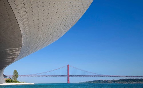 Lisbon, Landmark suspension 25 of April bridge over Tagus reiver near Belem tower