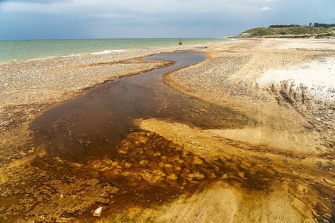 Tidal creek at Grönne Strand on Jammer Bay, Fjerritslev, Denmark, Europe