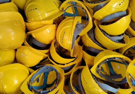 Yellow safety helmets for visitors to adjust, Rammelsberg Ore Mine, UNESCO World Heritage Site,