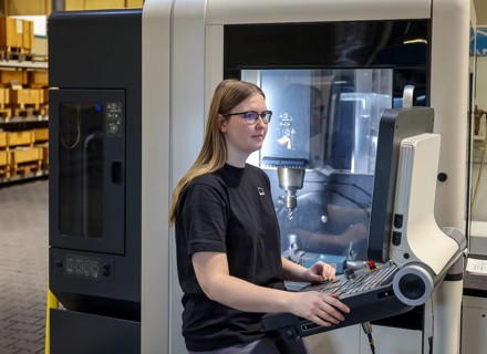 Oberhausen, North Rhine-Westphalia, Germany, Trainee woman in metalworking. Trainee cutting machine