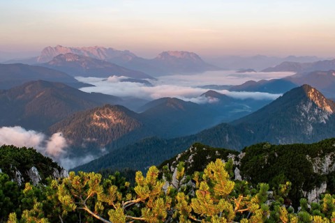 Sunrise in the Chiemgau Alps with a view of the Wilder Kaiser and fog in the valley, Bavaria,