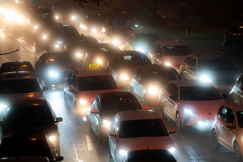Dense fog, with visibility sometimes less than 100 metres, city centre traffic during rush hour at