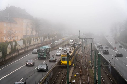 Dense fog, with visibility sometimes less than 100 metres, A40 motorway, city passage in Essen,