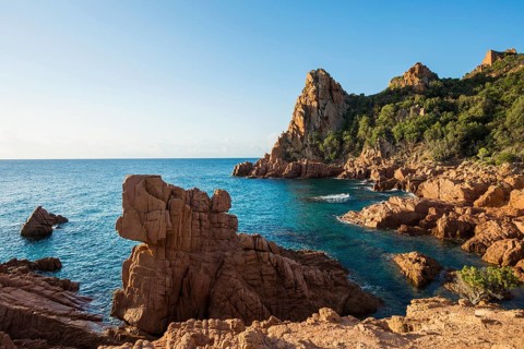 Red rocks and sea, Spiaggia Su Sirboni, sunrise, near Tertenia, Province of Ogliastra, Sardinia,