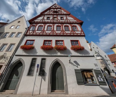 Former dance house with bread house, now municipal administration building, built in 1443,