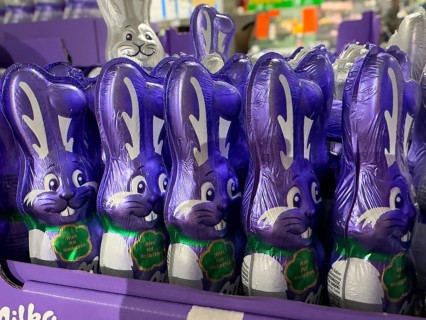 Display on retail shelf of wholesale chocolate Easter bunnies chocolate Easter bunnies wrapped in