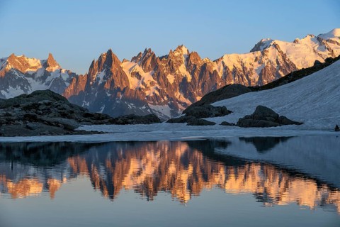 Evening mood, mountain landscape at sunset, alpenglow, water reflection in Lac Blanc, mountain