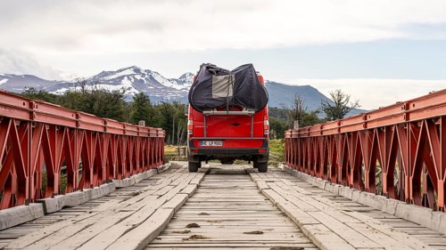 4x4 campervan crossing a bridge near Estancia Harberton, Tierra del Fuego Province, Argentina,