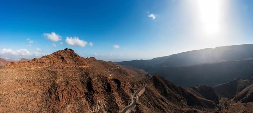 Mountain road at the Degollade de las Yeguas viewpoint with a view of the Barranco de Fataga, Gran