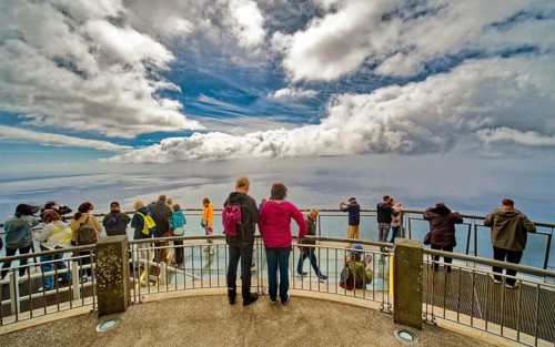 Floating glass platform, glass skywalk on the highest cape in Europe, tourist attraction, Cabo