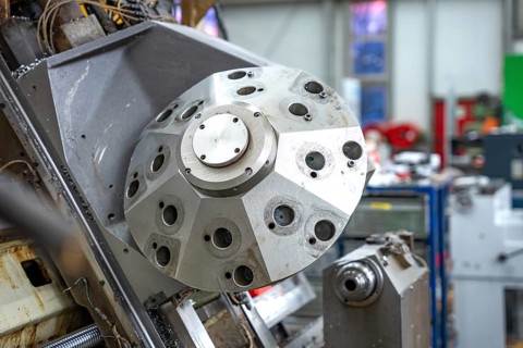 Close-up of an industrial machine part used for precision work