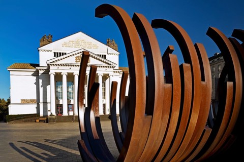 Opera Square with art sculpture 5 Arcs x 5 by Bernar Venet in front of the Deutsche Oper am Rhein,