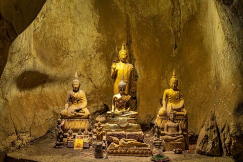 Buddha statues in the Pak Ou caves near Luang Prabang, Laos, Asia