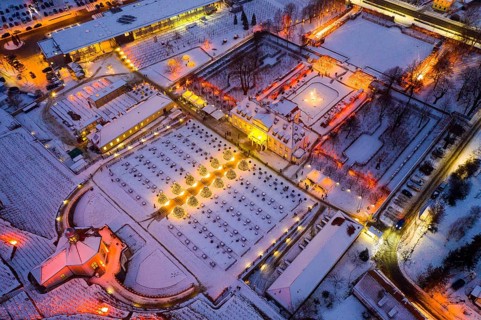 Aerial view of Wackerbarth Castle with castle park, belvedere and vineyards with snow and Christmas