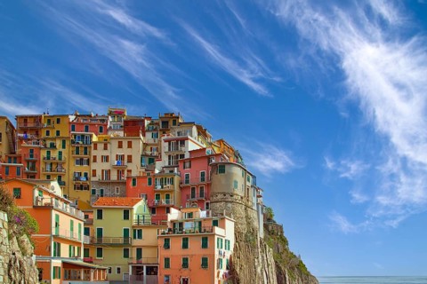 Cinque Terre, Italy, Scenic view of Vernazza shoreline and colorful buildings in a bay, Europe