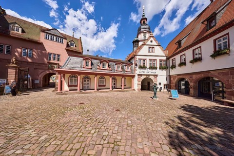 Old town hall, church tower, Erbach town church, historical buildings, blue sky with cumulus