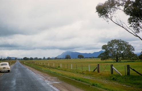 Approaching the Grampians National Park, mountains in the distance over sheep fields Victoria,