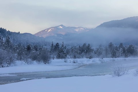 Isar valley in winter at temperatures of minus 18 degrees Celsius. Snow covered landscape with the