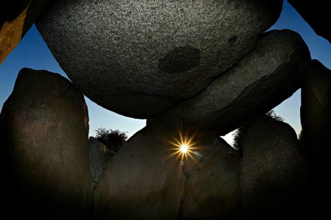 Sunset in the Sprove dolmen, sunlight falling through the stone blocks, Sprove, Møn Island,