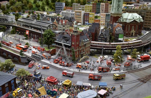 Fire brigade extinguishes burning house at Miniatur Wunderland Hamburg, Germany, Europe