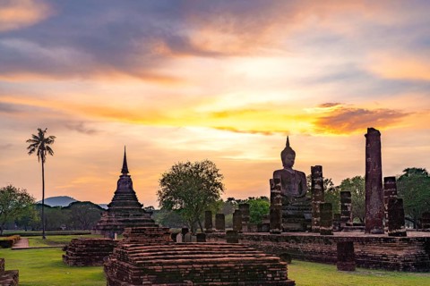The central Buddhist temple Wat Mahathat at sunset, UNESCO World Heritage Sukhothai Historical