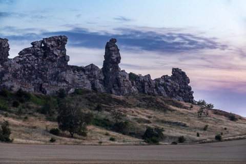 Devil's Wall with Königsstein stone formation in the last evening light, Weddersleben, Thale, Harz,