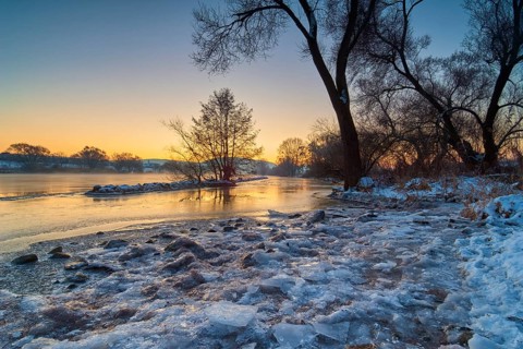 A frozen river in a wintry landscape at sunrise, Wörth am Main, Untermain, Main, Spessart,