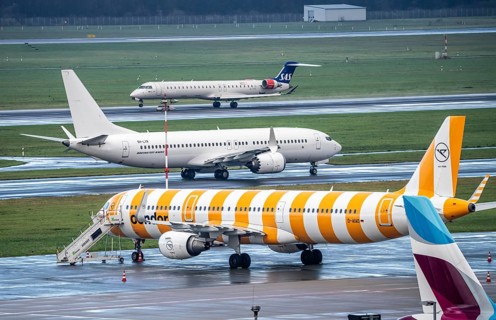 Düsseldorf Airport, Eurowings, Condor aircraft on the apron, SAS Mitsubishi CRJ-900LR on take-off,